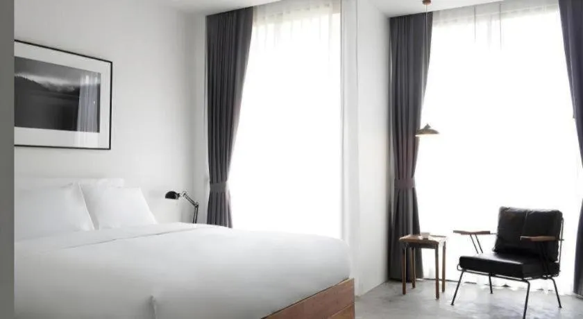 Bed in Rangsiya Boutique Hotel