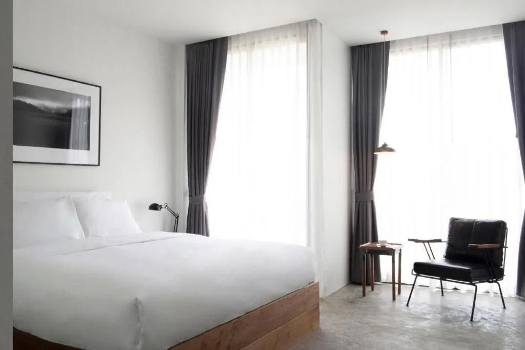 Bed in Rangsiya Boutique Hotel