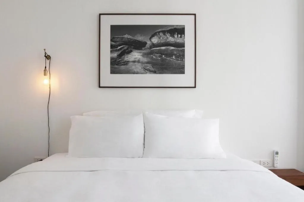 Bed in Rangsiya Boutique Hotel