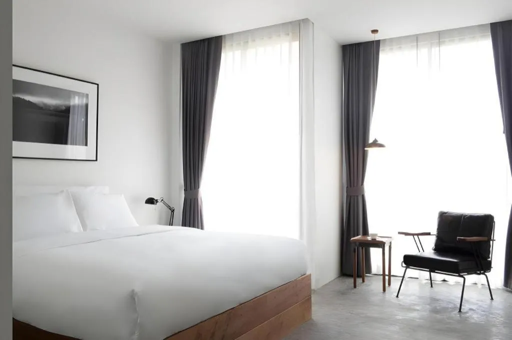 Bed in Rangsiya Boutique Hotel