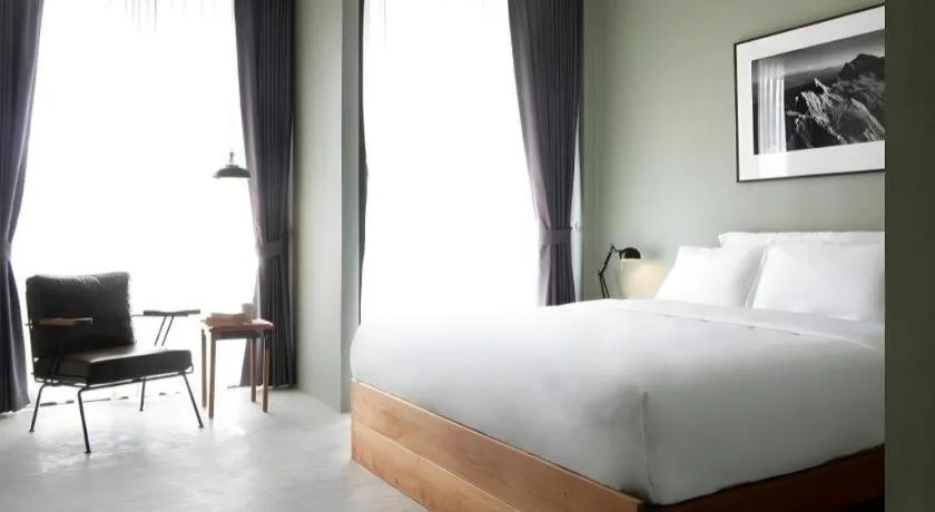 Bed in Rangsiya Boutique Hotel