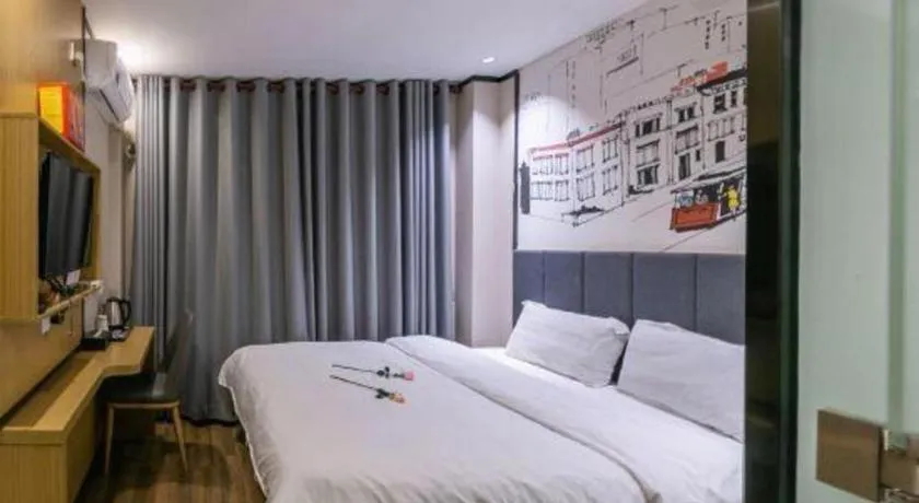 Bed in Yimi Hotel Guangzhou Sport College Branch