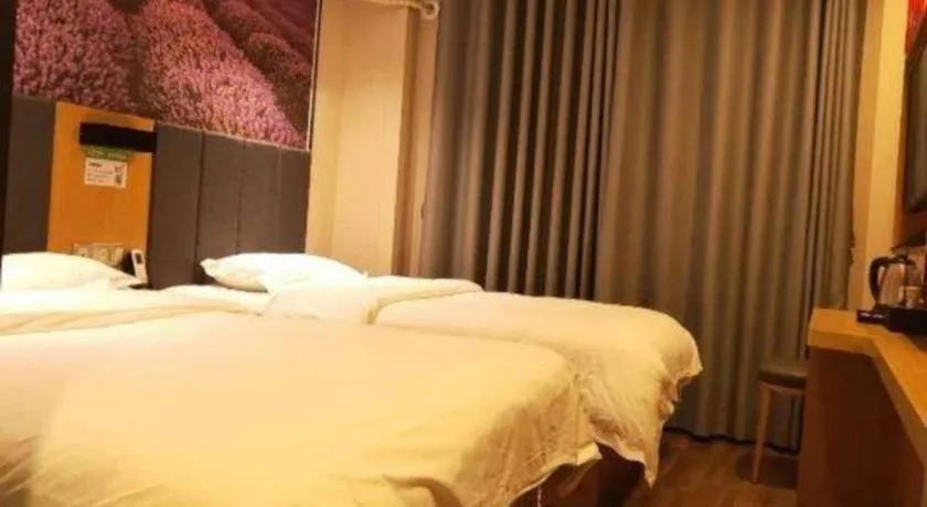 Bed in Yimi Hotel Guangzhou Sport College Branch