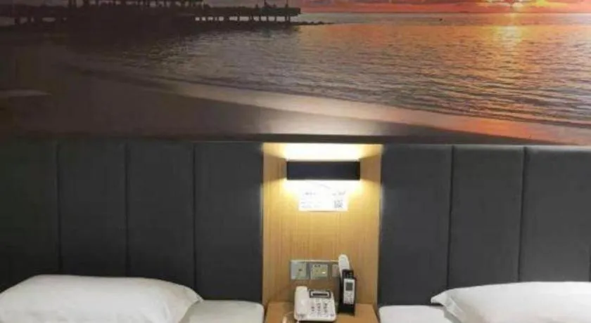 Bed in Yimi Hotel Guangzhou Sport College Branch