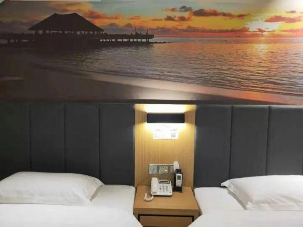 Bed in Yimi Hotel Guangzhou Sport College Branch