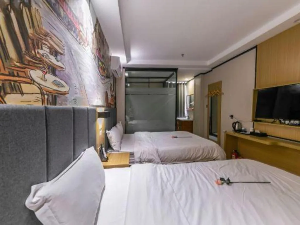 Bed in Yimi Hotel Guangzhou Sport College Branch