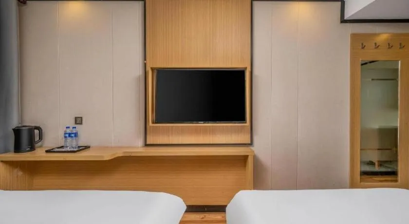 Bed in Yimi Hotel Guangzhou Sport College Branch