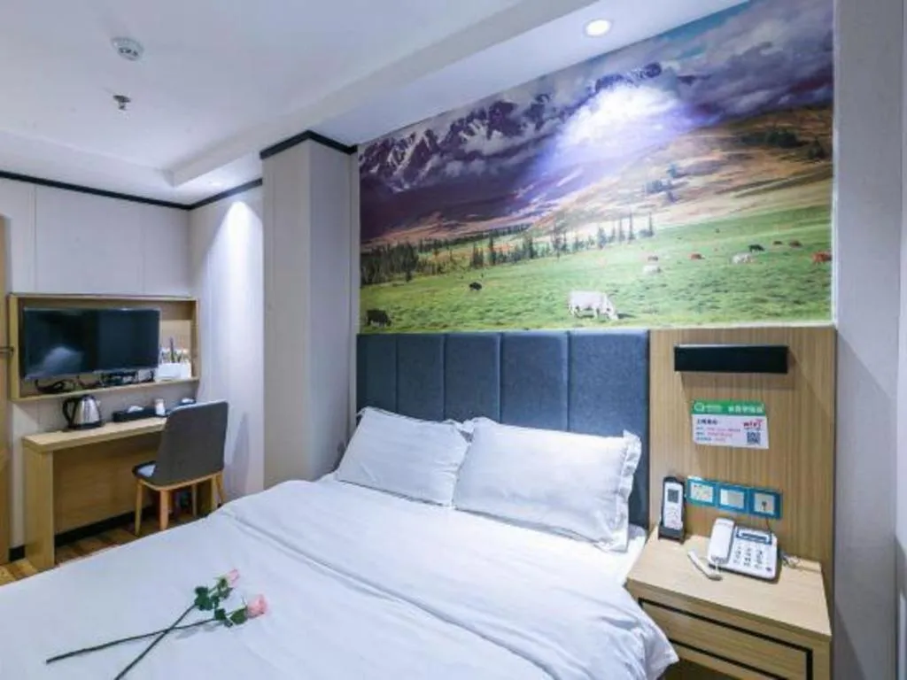 Bed in Yimi Hotel Guangzhou Sport College Branch