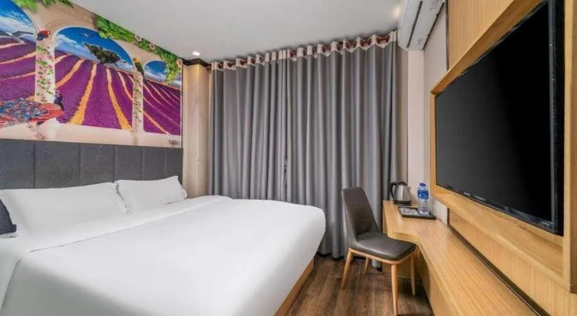 Bed in Yimi Hotel Guangzhou Sport College Branch