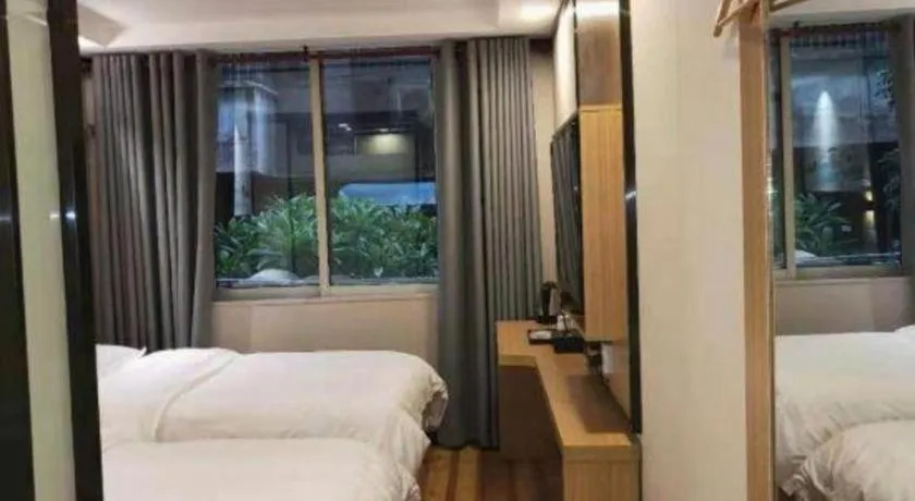 Bed in Yimi Hotel Guangzhou Sport College Branch