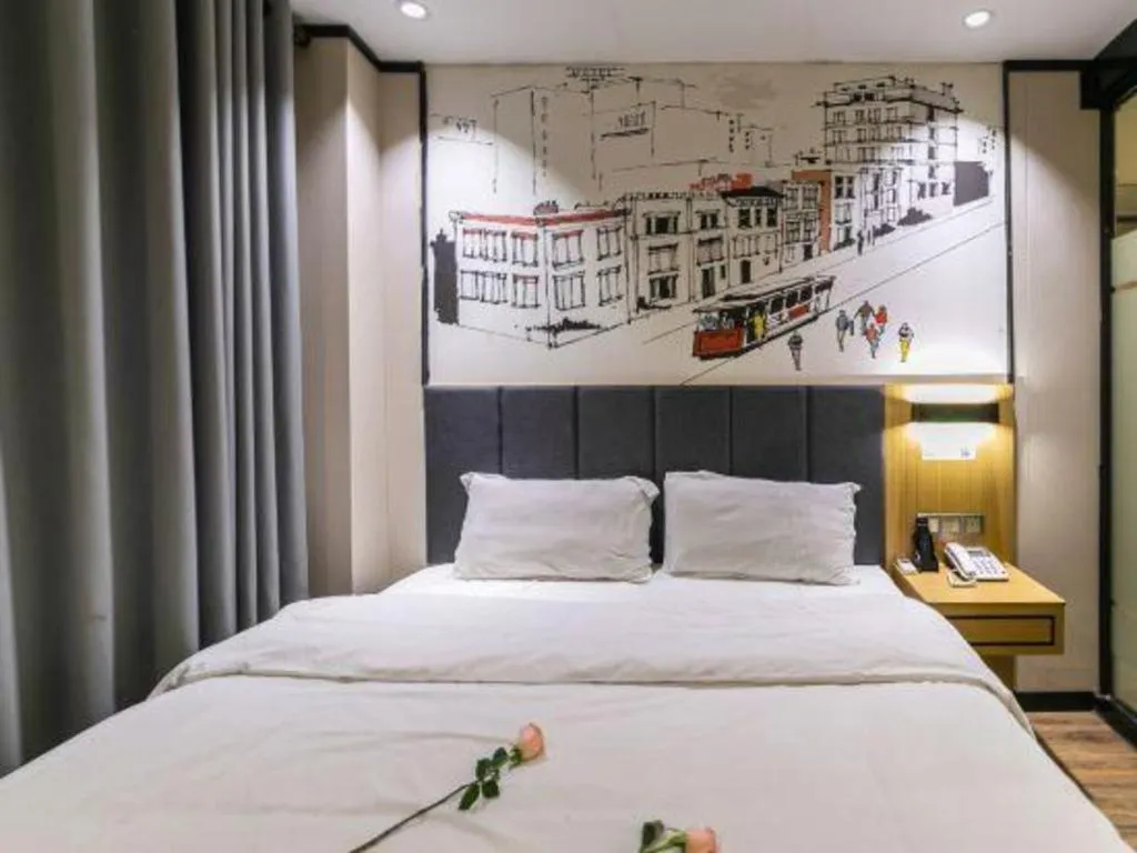 Bed in Yimi Hotel Guangzhou Sport College Branch