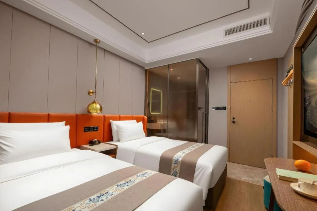 Bed in PAI Hotel·Chengdu Jintang Huaikou Huaizhou Avenue