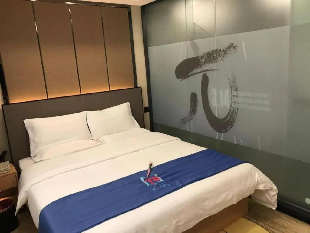 Bed in PAI Hotel·Chengdu Jintang Huaikou Huaizhou Avenue