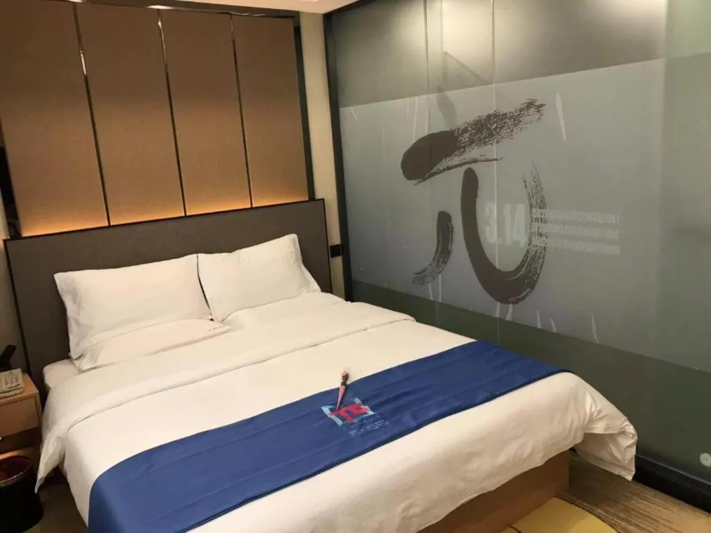 Bed in PAI Hotel·Chengdu Jintang Huaikou Huaizhou Avenue