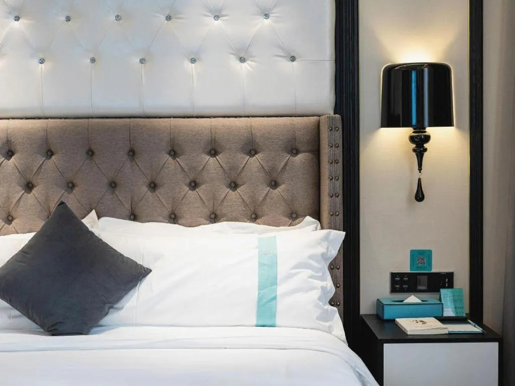 Bed in Xana Hotelle Shaghai Hongqiao Hub National Exhibition Center Qibao Lianming Road