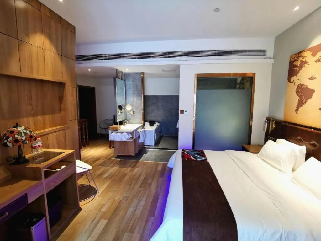 Bed in James Joyce Coffetel Zhengzhou CBD Exhibition Center Provincial People's Hospital