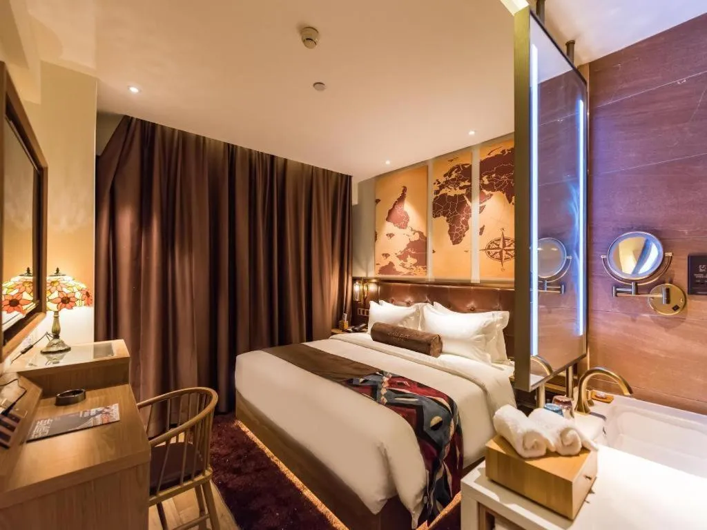 Bed in James Joyce Coffetel Zhengzhou CBD Exhibition Center Provincial People's Hospital