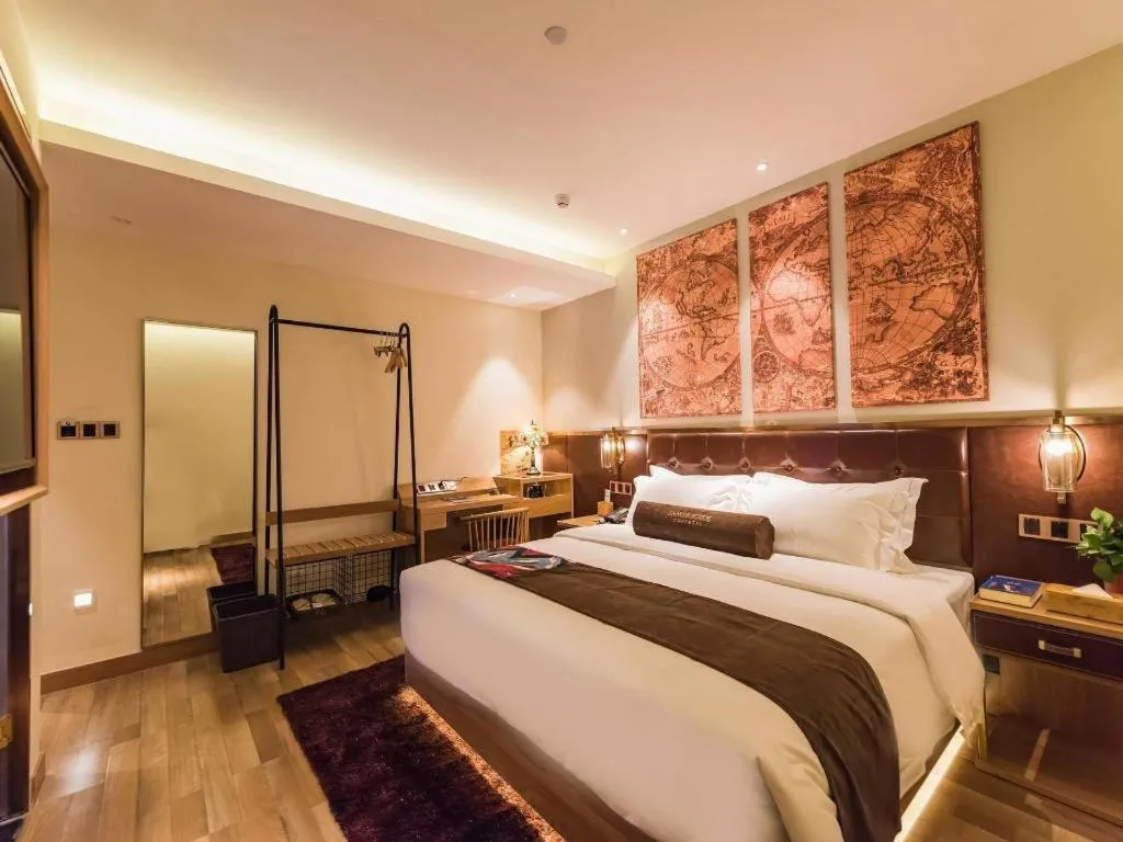 Bed in James Joyce Coffetel Zhengzhou CBD Exhibition Center Provincial People's Hospital