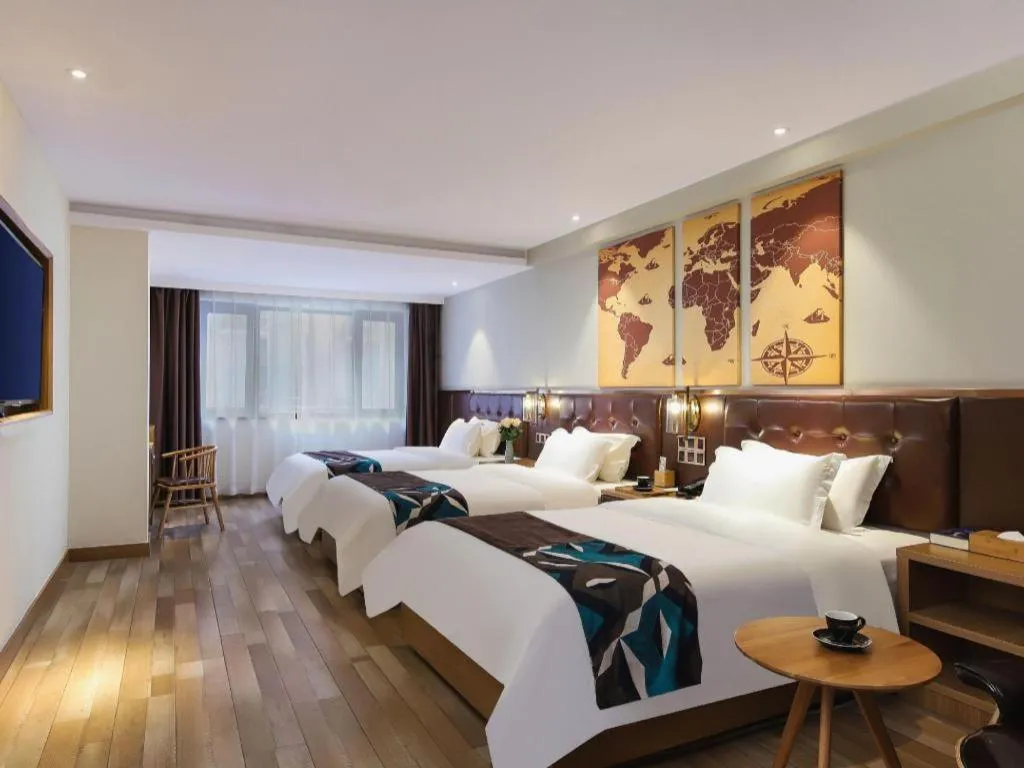 Bed in James Joyce Coffetel Zhengzhou CBD Exhibition Center Provincial People's Hospital