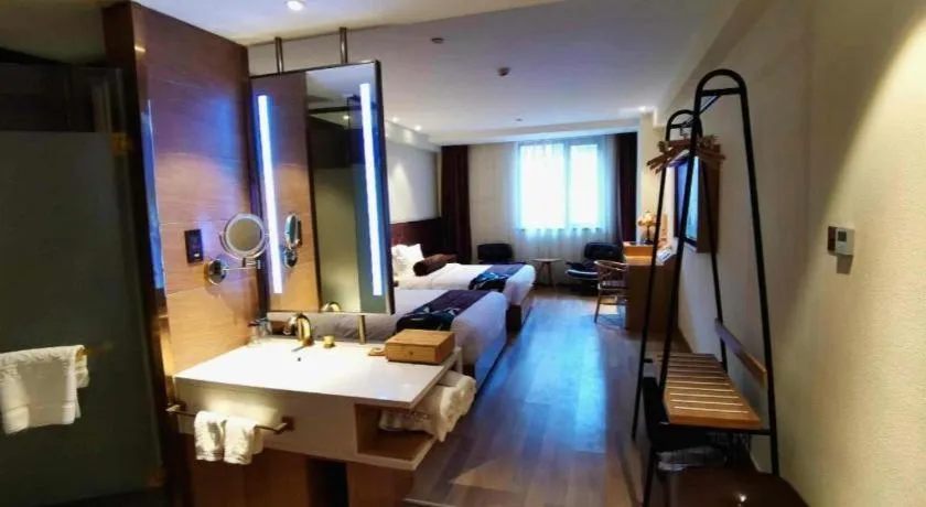 Bed in James Joyce Coffetel Zhengzhou CBD Exhibition Center Provincial People's Hospital