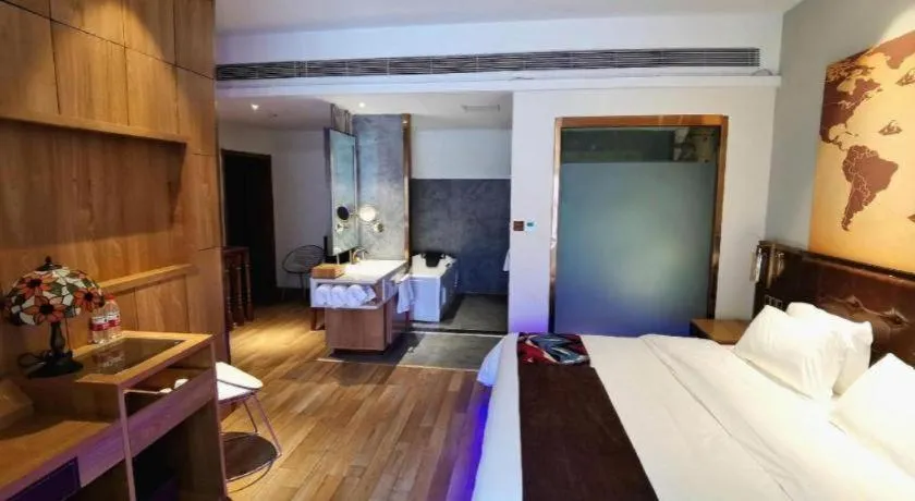 Bed in James Joyce Coffetel Zhengzhou CBD Exhibition Center Provincial People's Hospital