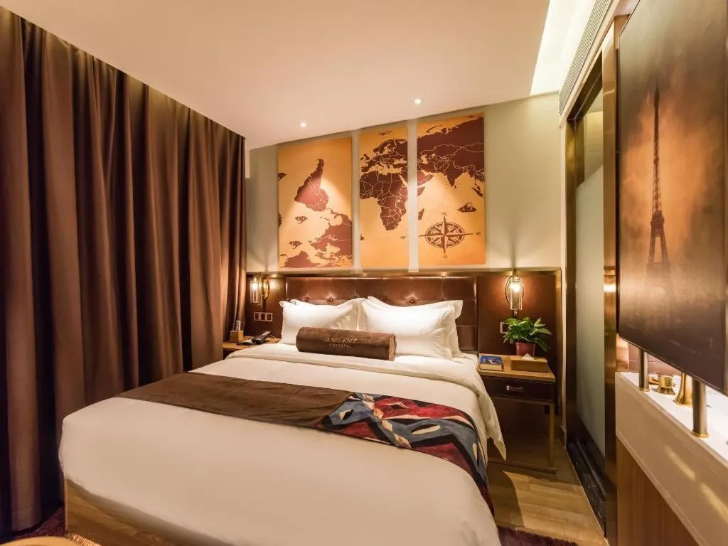 Bed in James Joyce Coffetel Zhengzhou CBD Exhibition Center Provincial People's Hospital