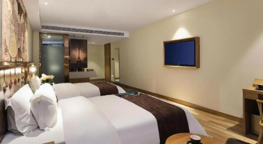 Bed in James Joyce Coffetel Zhengzhou CBD Exhibition Center Provincial People's Hospital