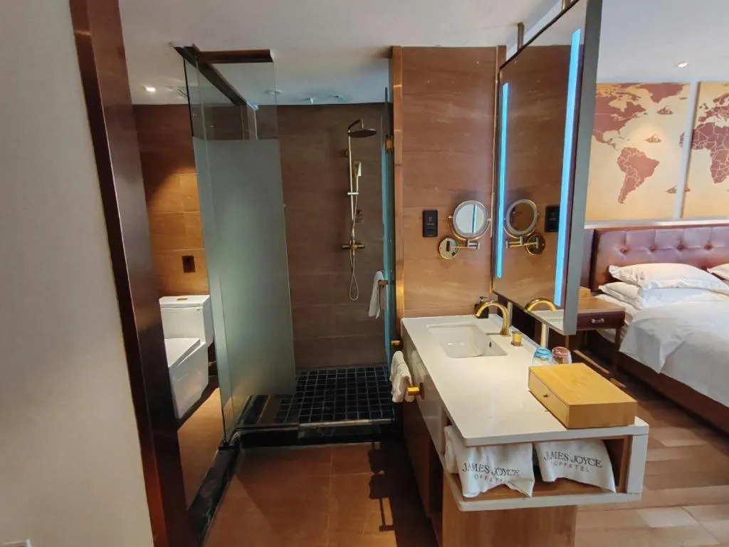 Bed in James Joyce Coffetel Zhengzhou CBD Exhibition Center Provincial People's Hospital