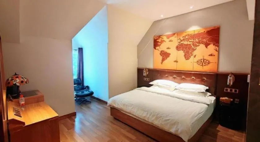 Bed in James Joyce Coffetel Zhengzhou CBD Exhibition Center Provincial People's Hospital