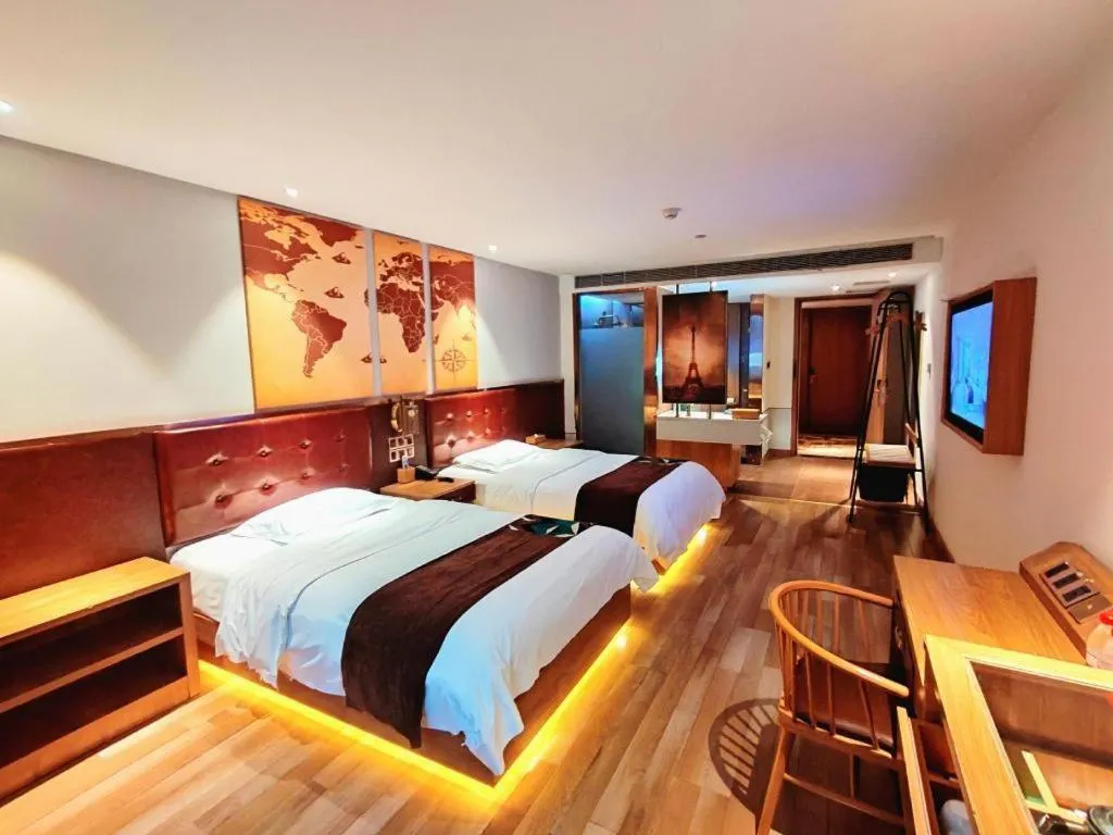 Bed in James Joyce Coffetel Zhengzhou CBD Exhibition Center Provincial People's Hospital