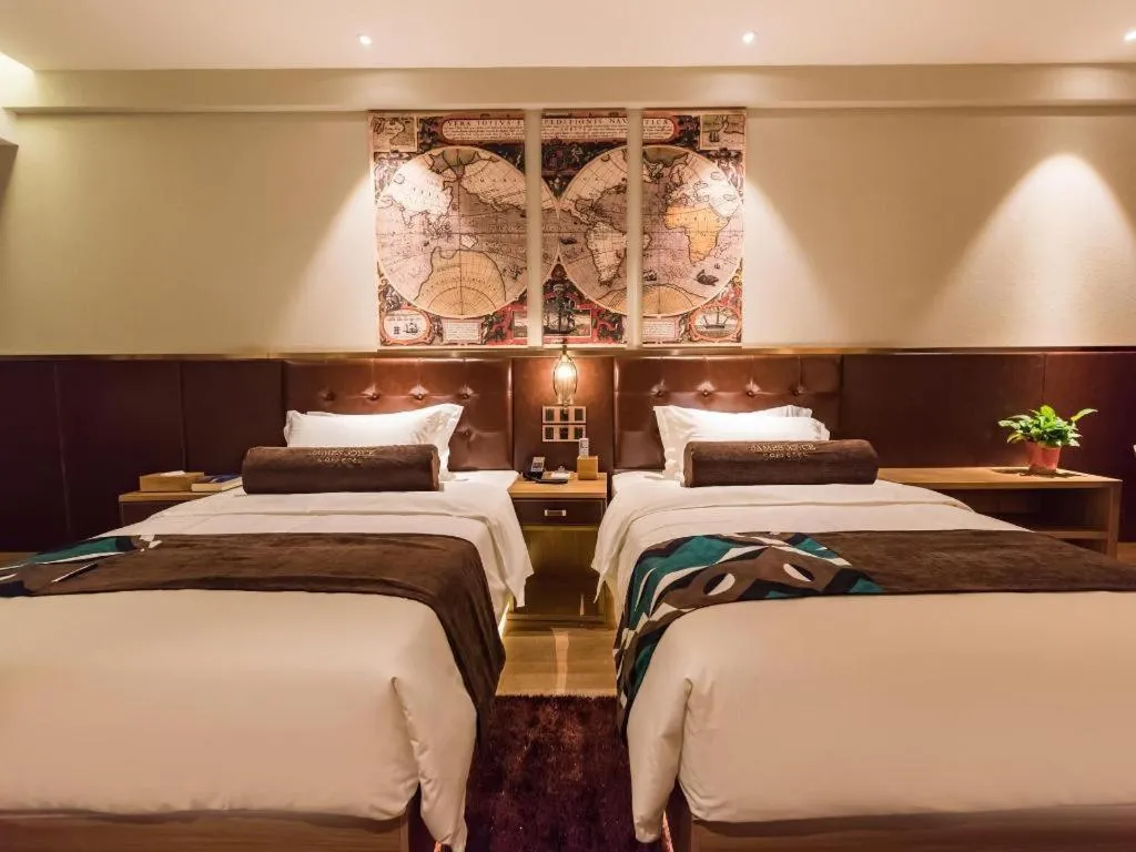 Bed in James Joyce Coffetel Zhengzhou CBD Exhibition Center Provincial People's Hospital