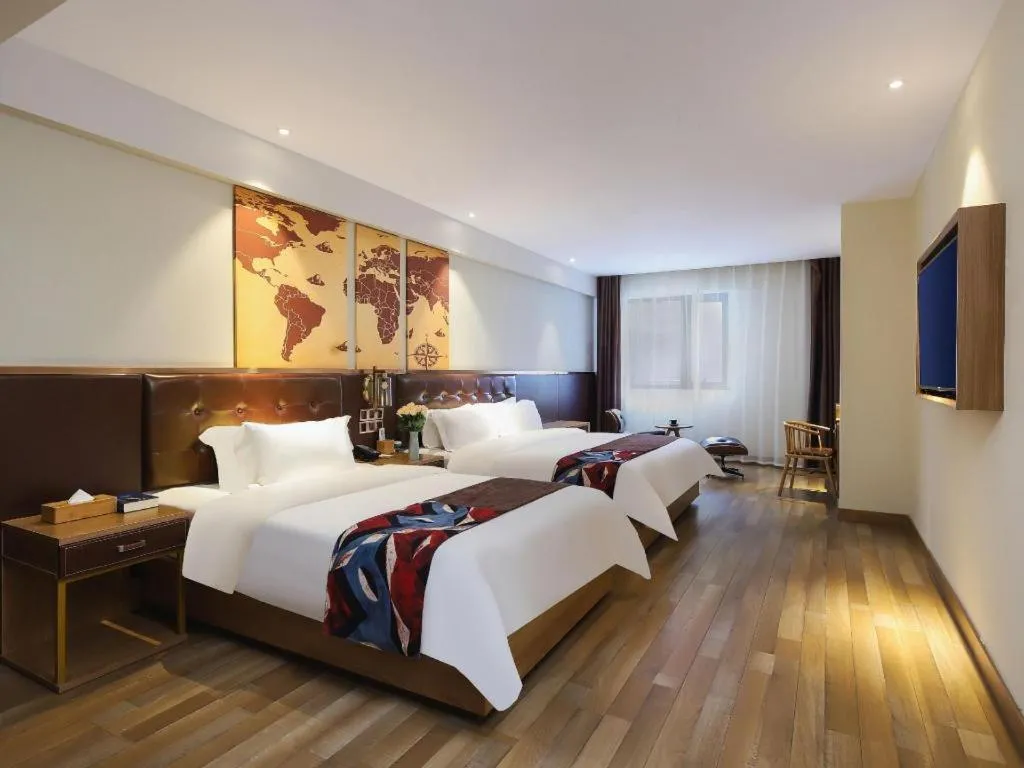 Bed in James Joyce Coffetel Zhengzhou CBD Exhibition Center Provincial People's Hospital