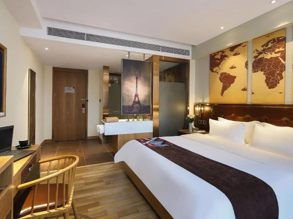 Bed in James Joyce Coffetel Zhengzhou CBD Exhibition Center Provincial People's Hospital