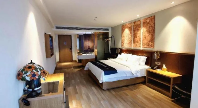 Bed in James Joyce Coffetel Zhengzhou CBD Exhibition Center Provincial People's Hospital