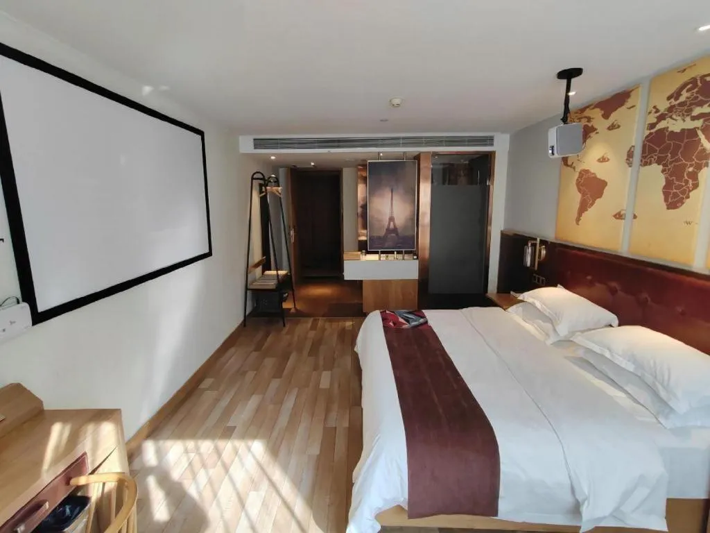 Bed in James Joyce Coffetel Zhengzhou CBD Exhibition Center Provincial People's Hospital