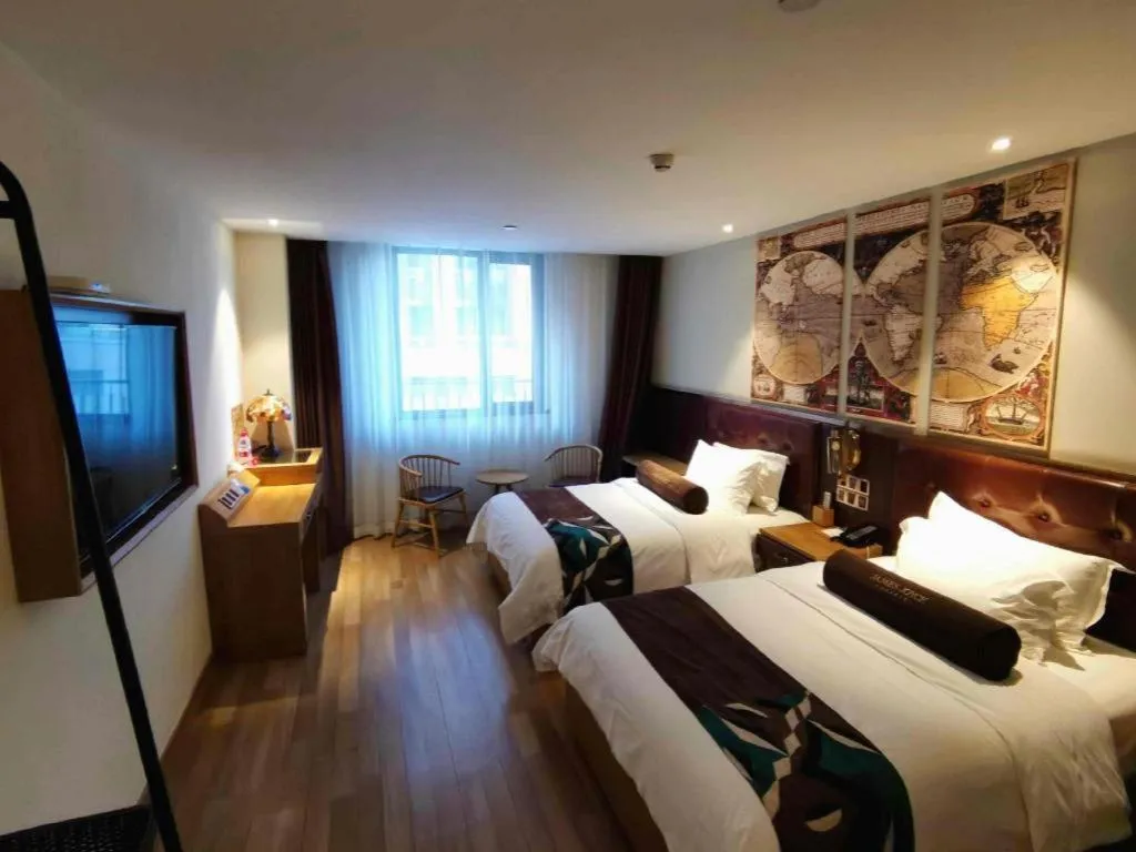 Bed in James Joyce Coffetel Zhengzhou CBD Exhibition Center Provincial People's Hospital