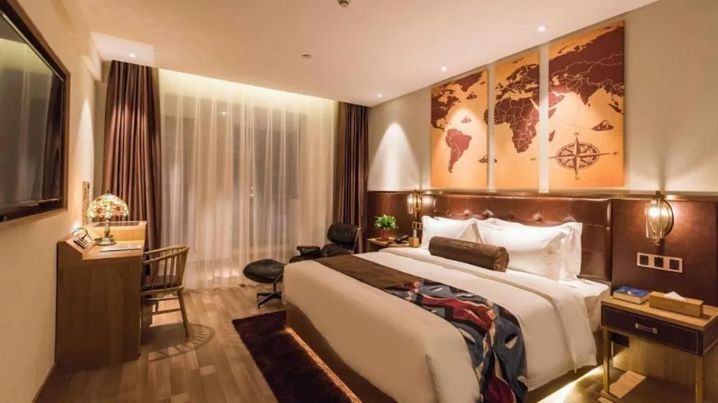 Bed in James Joyce Coffetel Zhengzhou CBD Exhibition Center Provincial People's Hospital