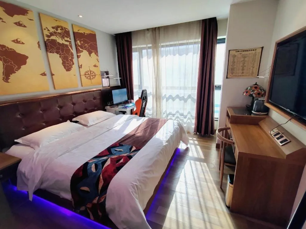 Bed in James Joyce Coffetel Zhengzhou CBD Exhibition Center Provincial People's Hospital