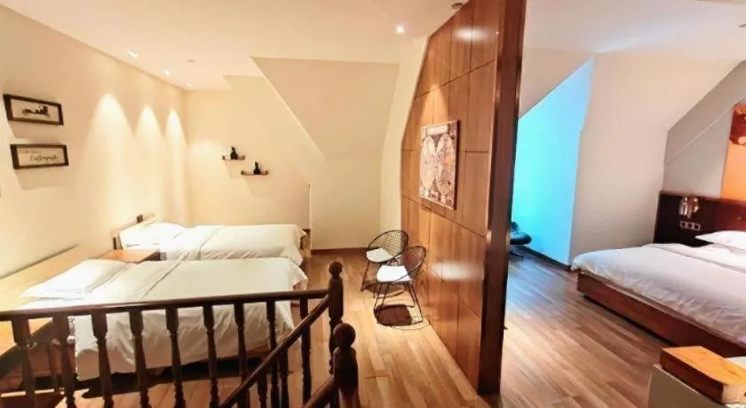 Bed in James Joyce Coffetel Zhengzhou CBD Exhibition Center Provincial People's Hospital