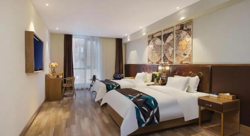 Bed in James Joyce Coffetel Zhengzhou CBD Exhibition Center Provincial People's Hospital