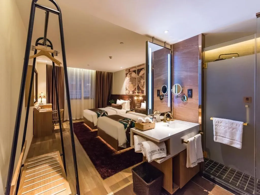 Bed in James Joyce Coffetel Zhengzhou CBD Exhibition Center Provincial People's Hospital