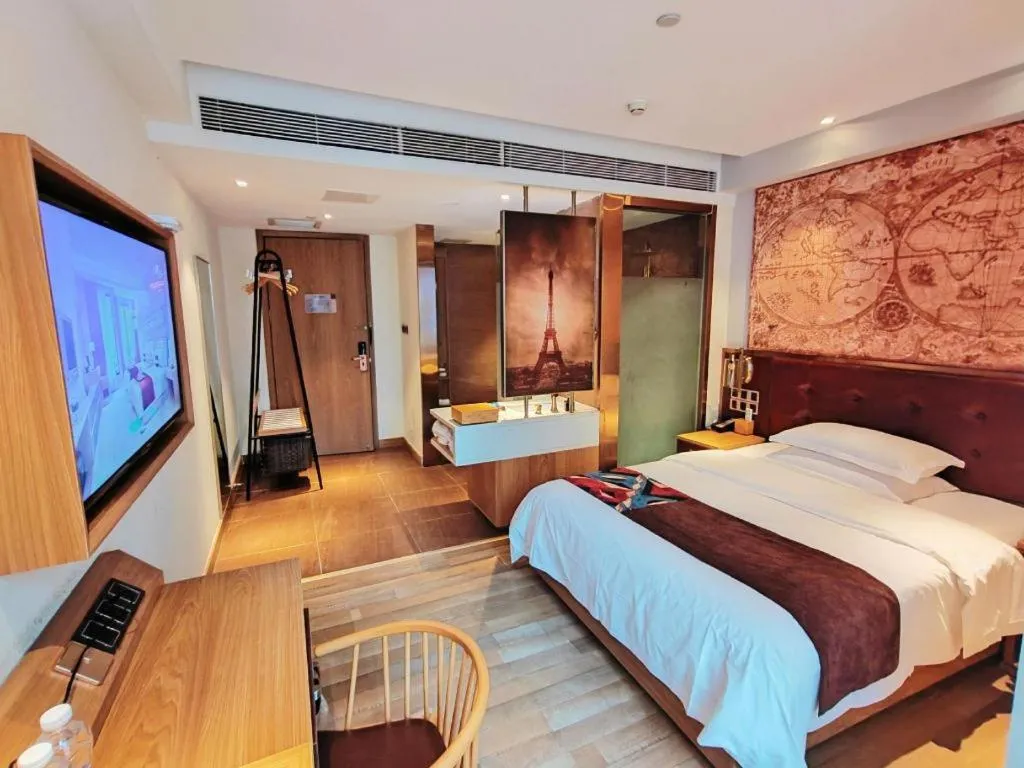 Bed in James Joyce Coffetel Zhengzhou CBD Exhibition Center Provincial People's Hospital