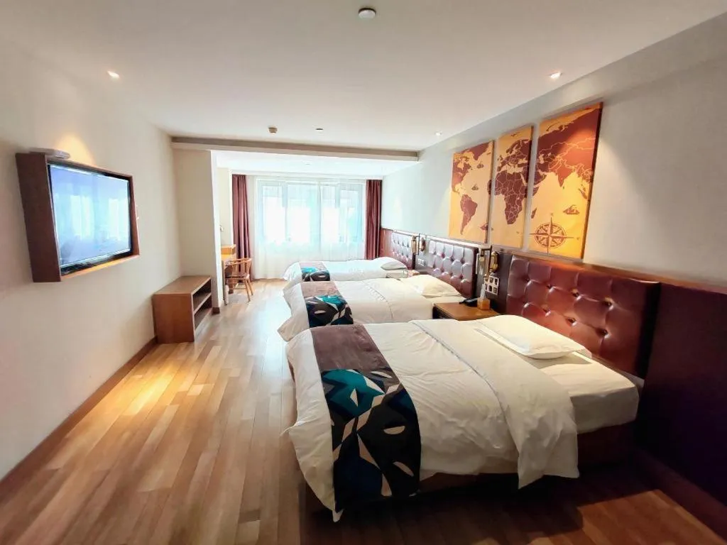 Bed in James Joyce Coffetel Zhengzhou CBD Exhibition Center Provincial People's Hospital
