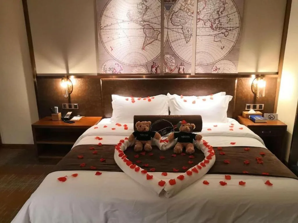 Bed in James Joyce Coffetel Zhengzhou CBD Exhibition Center Provincial People's Hospital