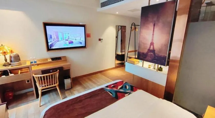 Bed in James Joyce Coffetel Zhengzhou CBD Exhibition Center Provincial People's Hospital