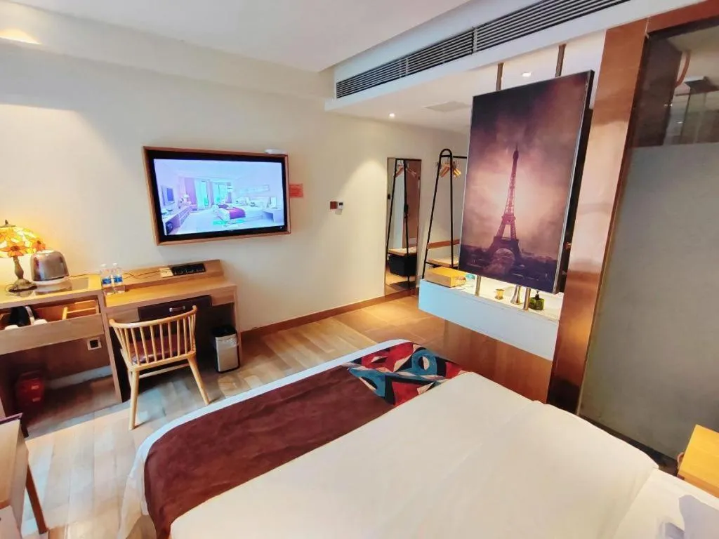 Bed in James Joyce Coffetel Zhengzhou CBD Exhibition Center Provincial People's Hospital