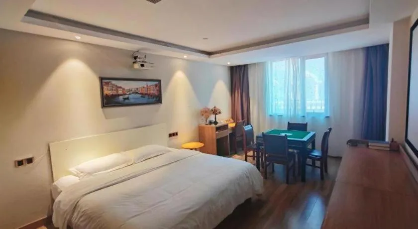 Bed in James Joyce Coffetel Zhengzhou CBD Exhibition Center Provincial People's Hospital