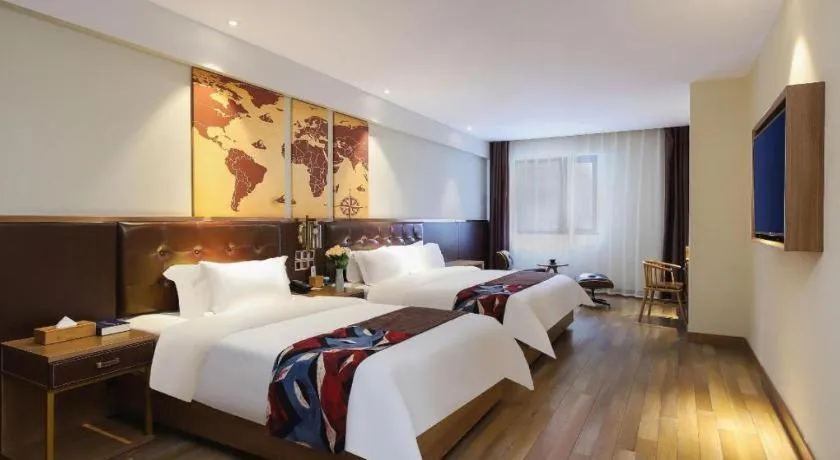 Bed in James Joyce Coffetel Zhengzhou CBD Exhibition Center Provincial People's Hospital