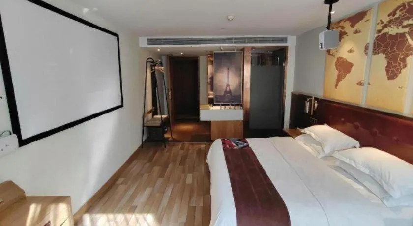 Bed in James Joyce Coffetel Zhengzhou CBD Exhibition Center Provincial People's Hospital