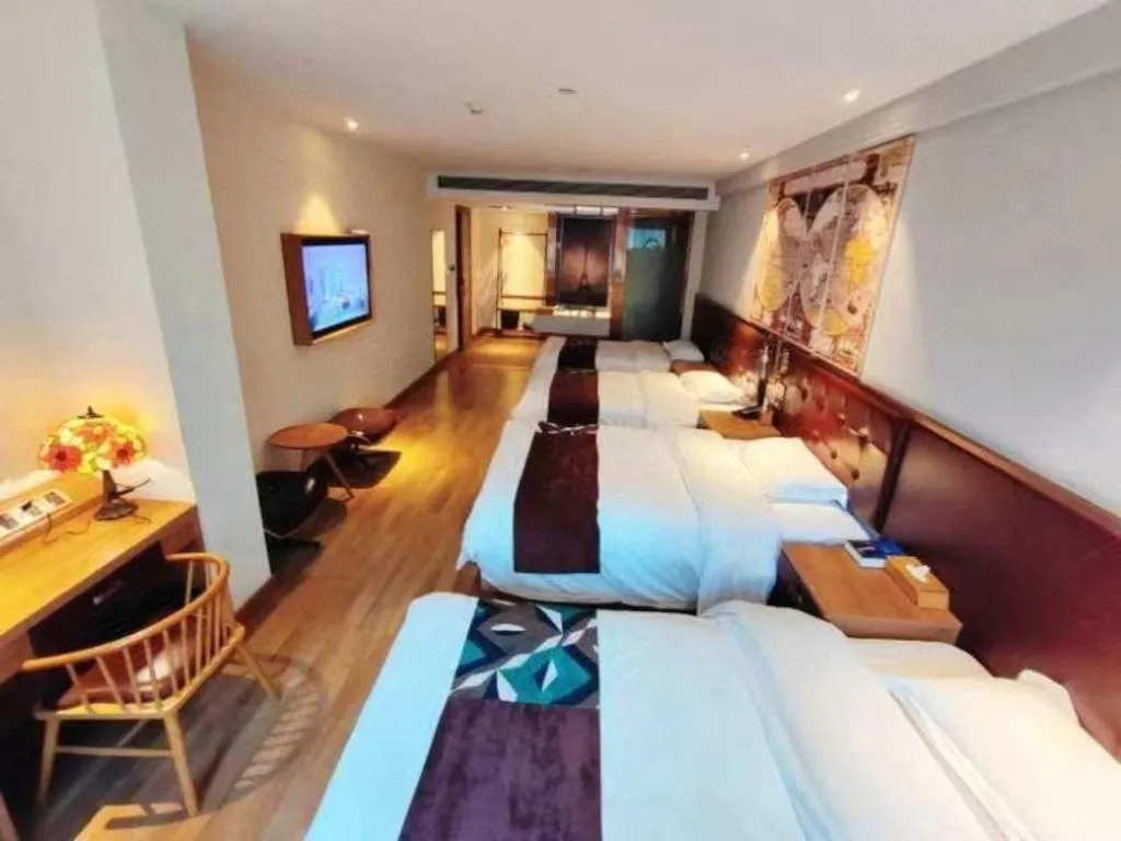 Bed in James Joyce Coffetel Zhengzhou CBD Exhibition Center Provincial People's Hospital